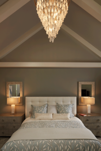 elegant master bedroom with vaulted ceiling