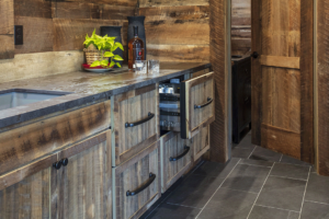 rustic man cave with reclaimed wood cabinets