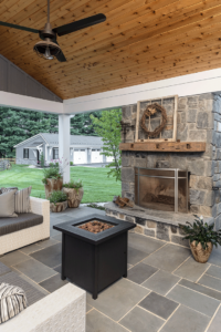 rustic fireplace in modern farmhouse patio
