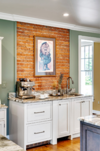 eclaimed brick and fireplace add a touch of the past to the coffee bar