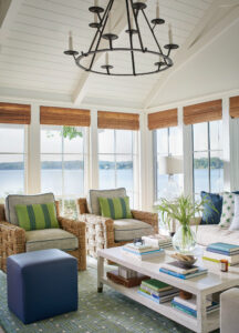 nautical sunroom addition overlooking severn river with clapboard ceiling and custom fabrics and finishes by mueller homes