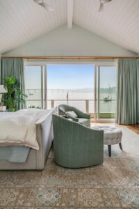 BEDROOM OVERLOOKING SEVERN RIVER IN HOME RENOVATION BY MUELLER HOMES
